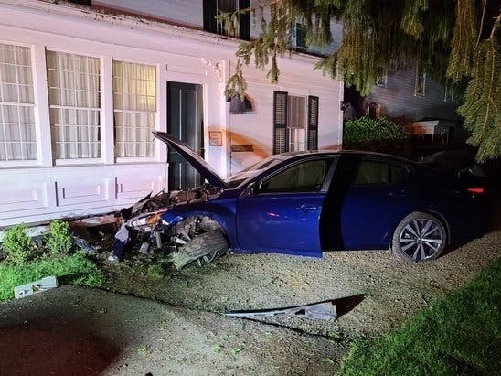 A crash at the Tolland Inn led to two arrests.