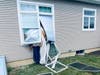 A car slammed into a Tolland home Friday. 