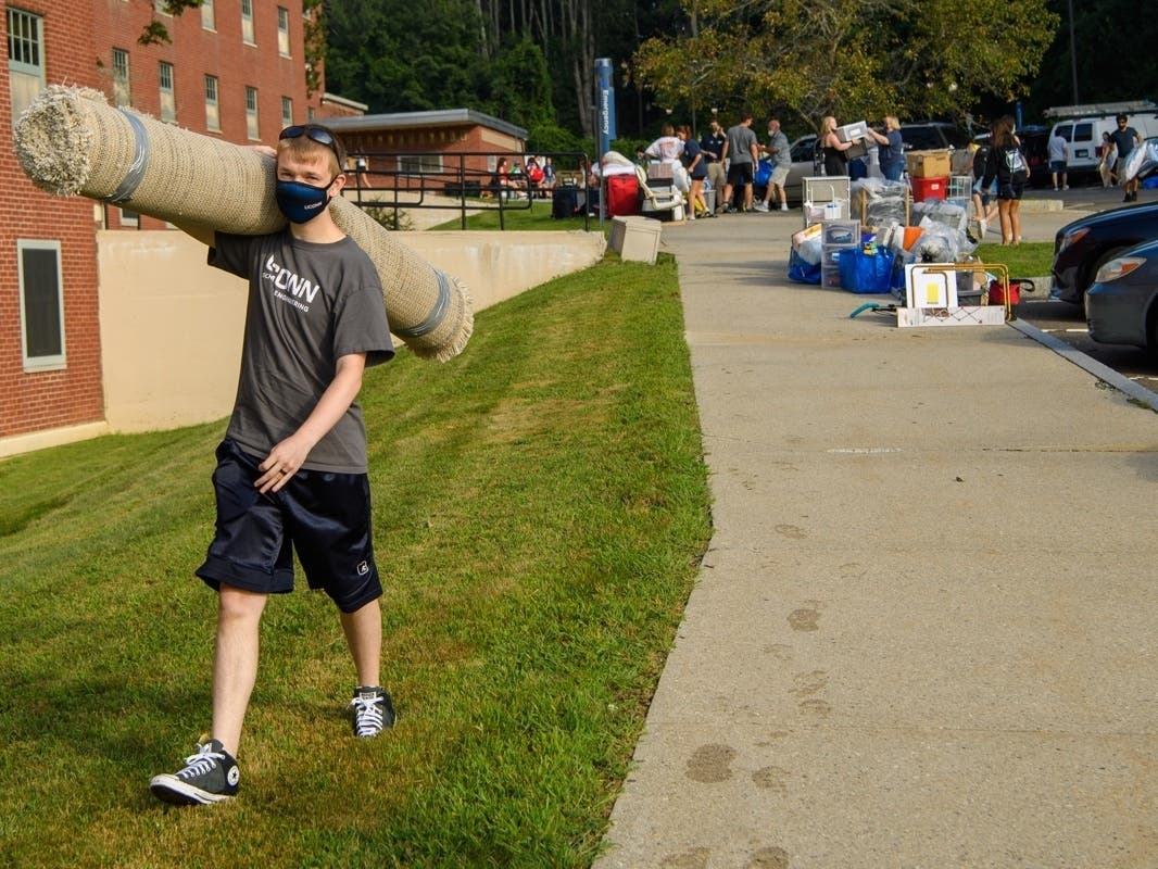 Students began moving into the University of Connecticut Friday under a strict set of coronavirus guidelines. 