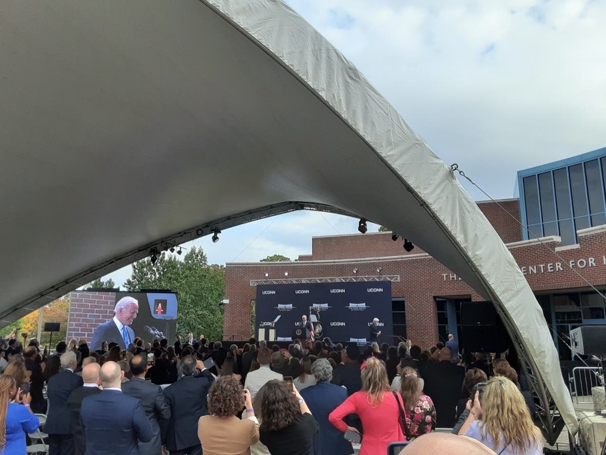 U.S. President Joe Biden takes the podium after being introduced by former U.S. Sen. Christopher Dodd at the re-dedication of The Dodd Center For Human Rights at UConn Friday. 