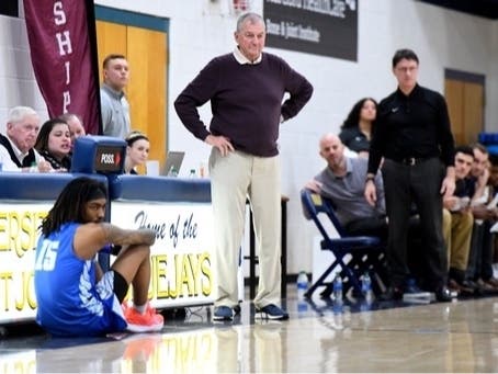 Jim Calhoun is passing the torch to longtime coaching teammate Glenn Miller (right) at USJ. Calhoun seemed to have a sense of accomplishment as he stepped down from the coaching job there this week. 