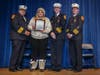  Zaida Rodriguez Adorno received the Citizen’s Life Saving Award for saving a toddler who was choking on a grape. She is joined by Assistant Chief Alan Arel, left, Assistant Chief Robert Babcock and Fire Chief Stephen Eppler.