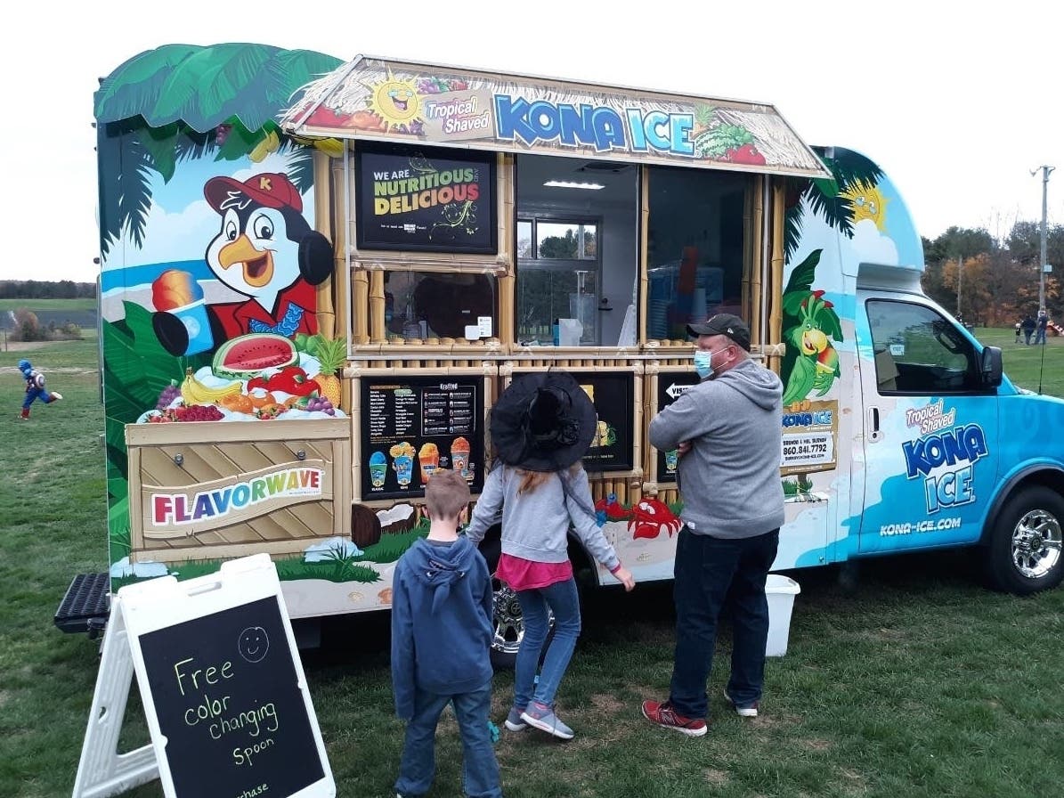 The Kona Ice truck is offering free treats at two locations in Manchester on Tax Day. 