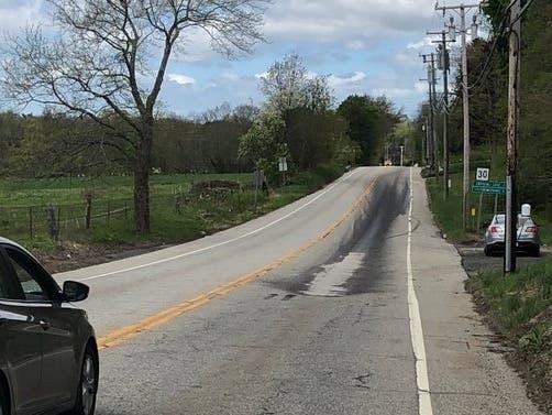 Crews had to clean up an oil spill after an incident on Crystal Lake Road in Tolland. 