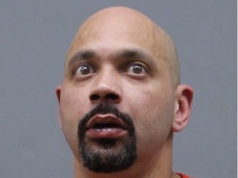 The booking image of John Glasper.