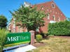 An M&T sign is up at a former People's United Branch in Enfield. 