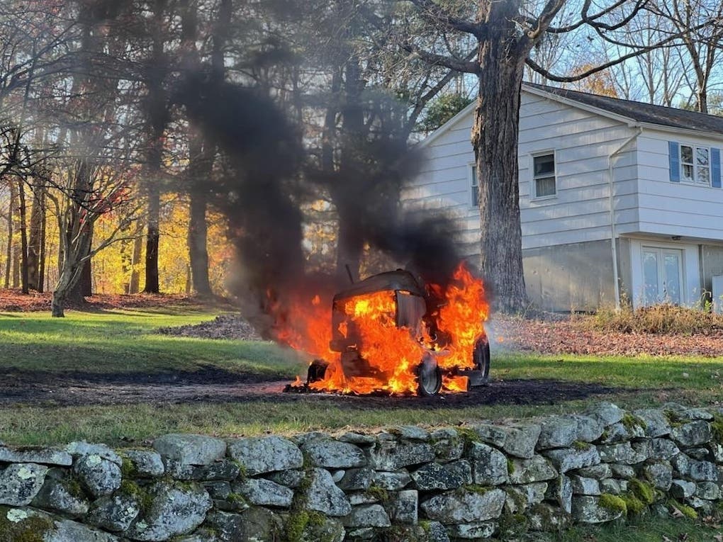 A lawnmower burst into flames in Tolland Monday. 