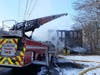 Firefighters were still pouring water at the old baseball factory at 114 Brooklyn St. in Vernon hours after a fire ravaged the building. 