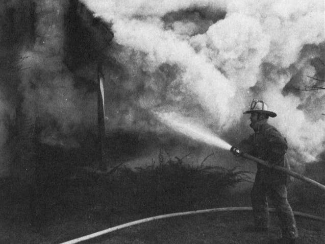 Ron Littell Sr. fighting a 1981 fire. 