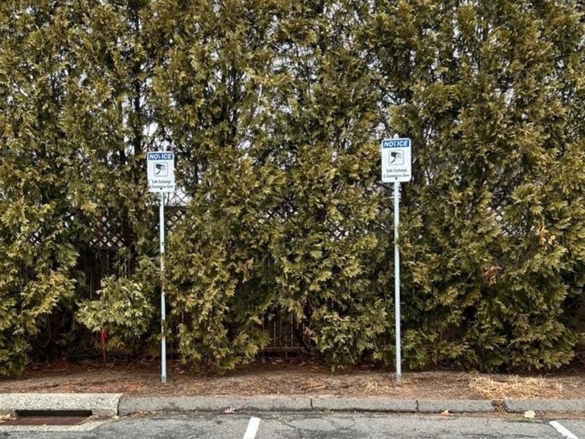 Spots are reserved for safe transactions at the Glastonbury Police Department. 