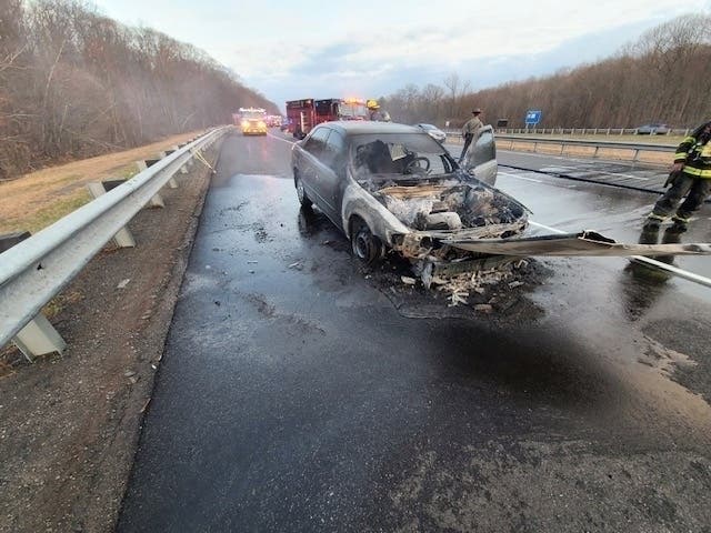 A car fire broke out on the highway near the Vernon-Tolland line Tuesday evening. 