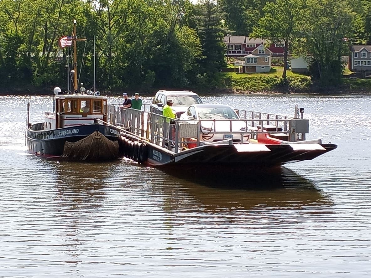 The Glastonbury-to-Rocky Hill ferry takes vehicles across the Connecticut River on Wednesday. 