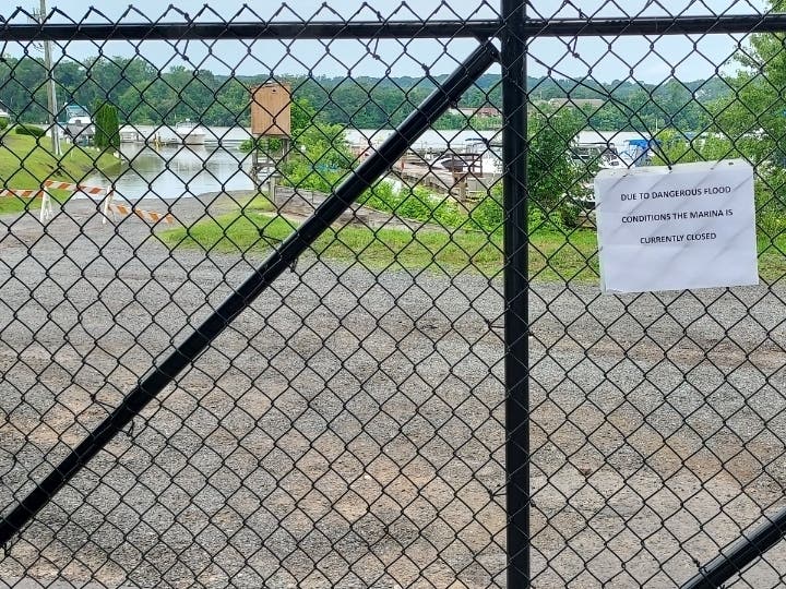 A closed marina in Glastonbury shows how dangerous the Connecticut River water levels are this week, as Middletown found out with a dock that broke loose and floating into local waters. (Tim Jensen/Patch).
