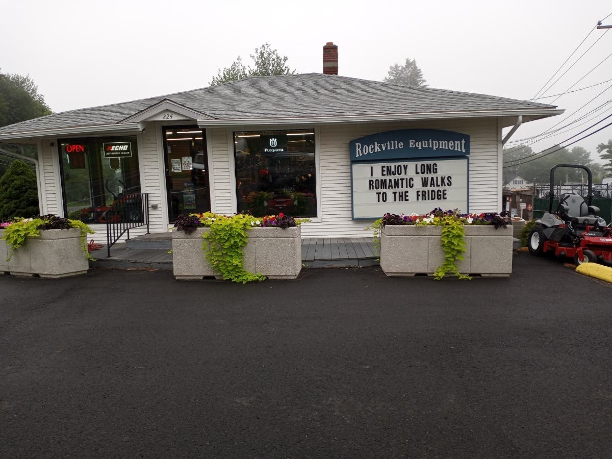 The message board at Rockville Equipment is a source for a smile for this driving by. 
