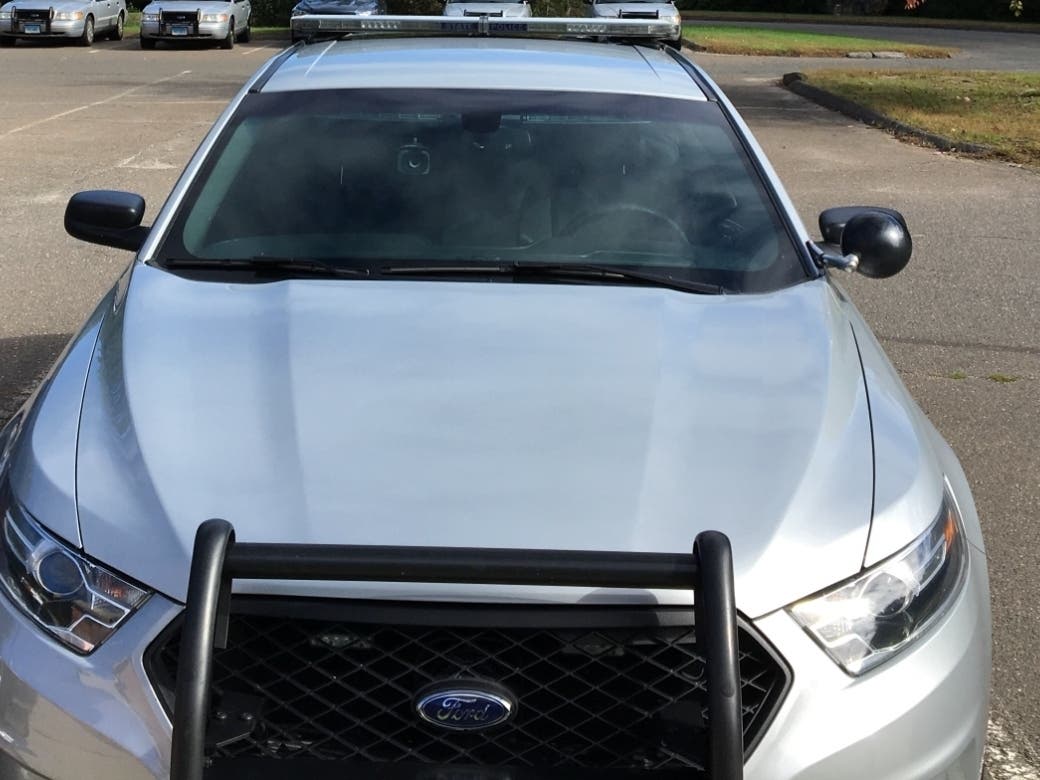 A driver from Manchester has ben charged with DUI in connection with a crash at a liquor store. 