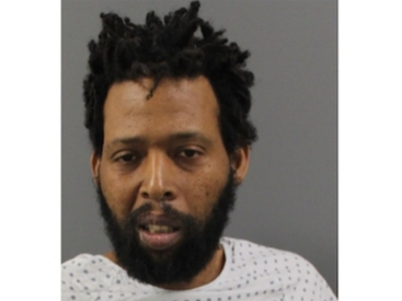 The booking image of Daniel Ceasar.