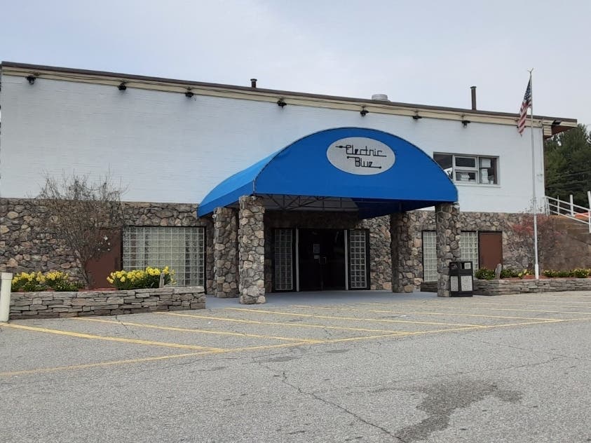 A weekend disturbance at the Electric Blue cafe in Tolland led to an arrest, state police said. 