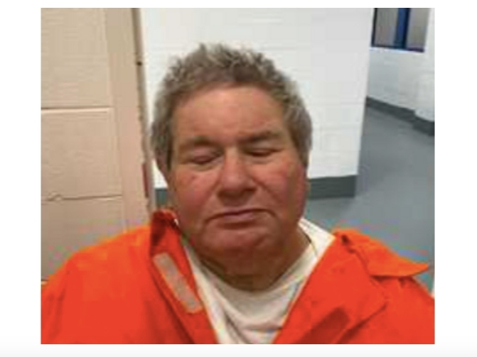 The booking image of Scott Predom.