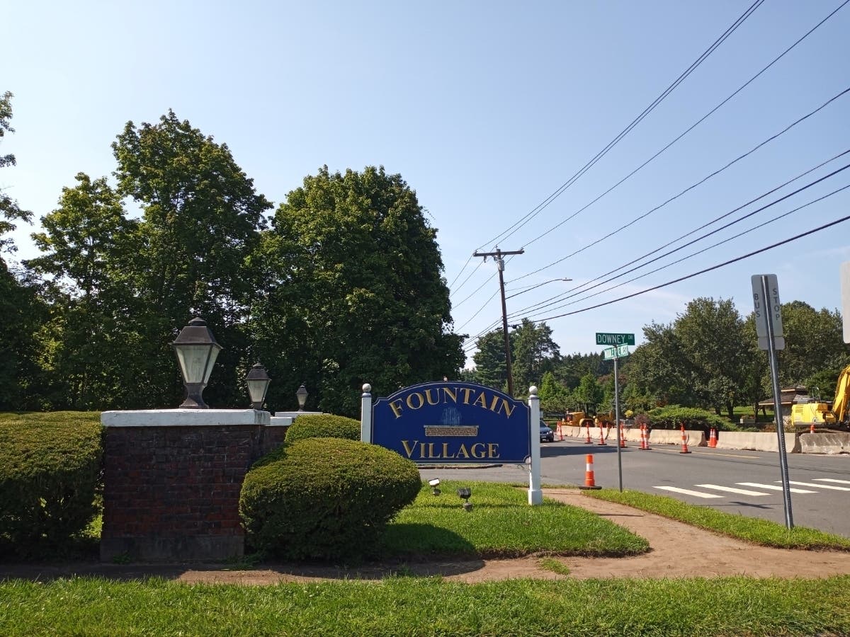 A quick-thinking janitor saved the day after a fire broke out at a Manchester apartment complex Tuesday.