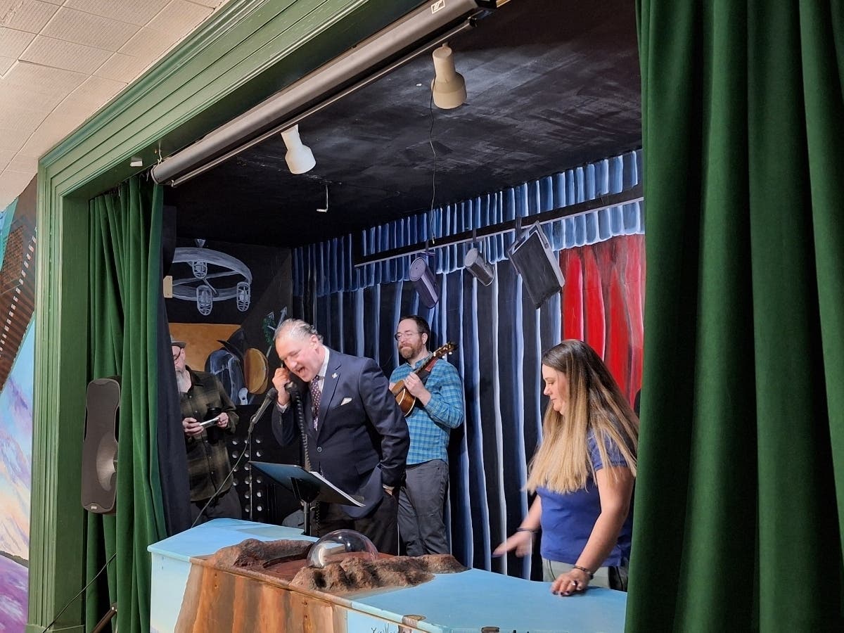 At the Lutz Children's Museum early Monday, Manchester Mayor Jay Moran gets the official news from Chuckles, the state groundhog — six more weeks of winter. 