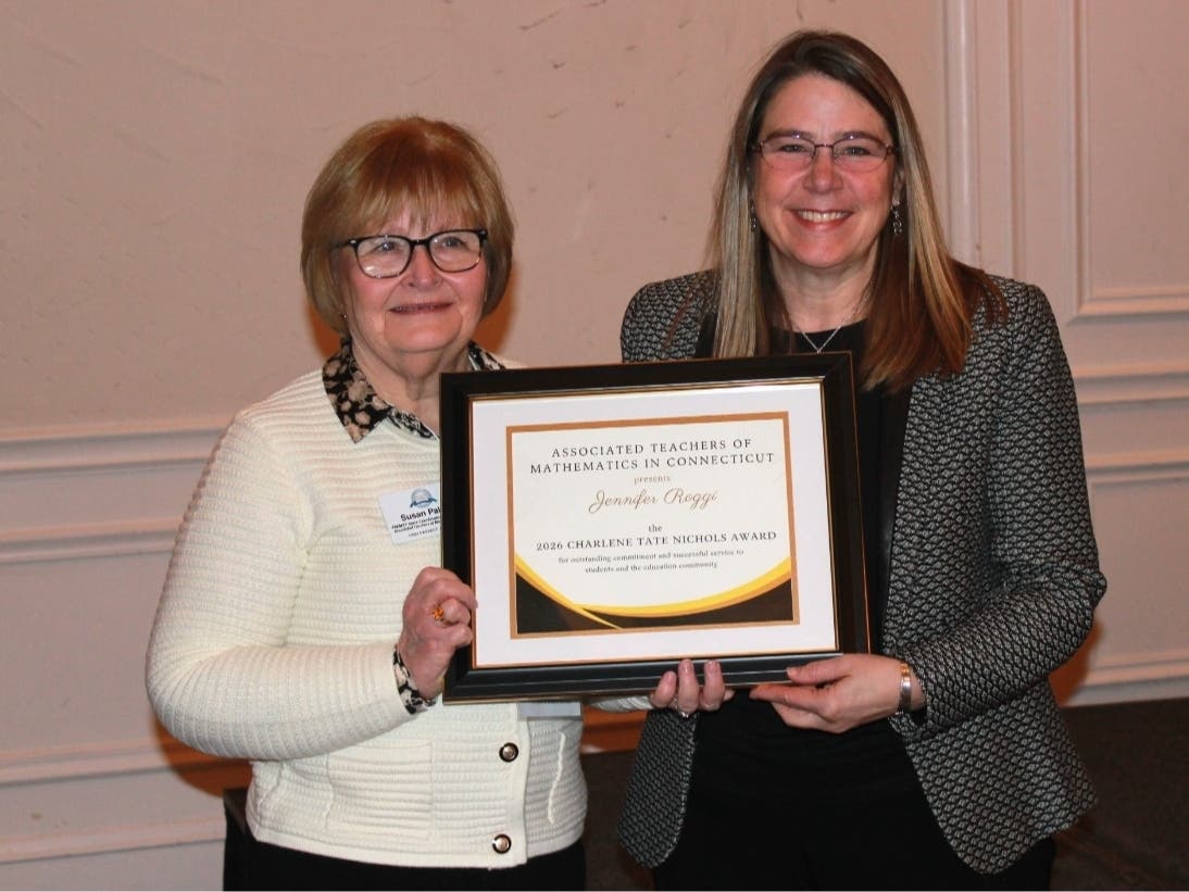 Vernon Center Middle School teacher Jennifer Roggi received the Charlene Tate Nichols award Monday at ATOMIC's conference.