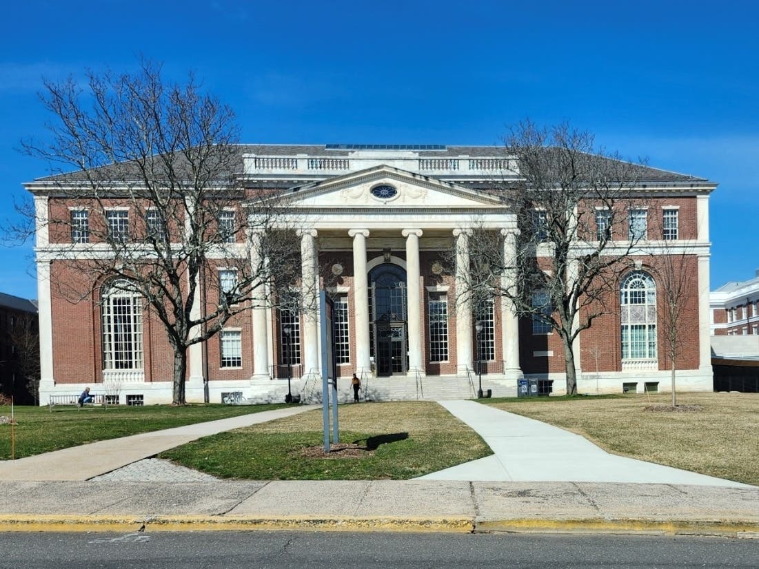 A former student at Wesleyan University. is accused of spying on other students, police said.