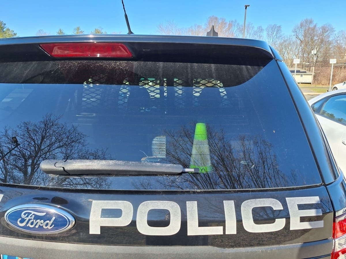 A VA driver from Manchester is facing more than 20 charges for the misuse of a government payment card in Glastonbury, police said. 