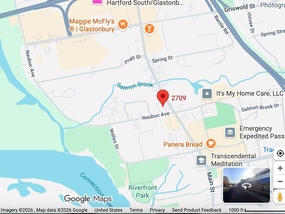 A car wound up in Salmon Brook in Glastonbury Wednesday. 