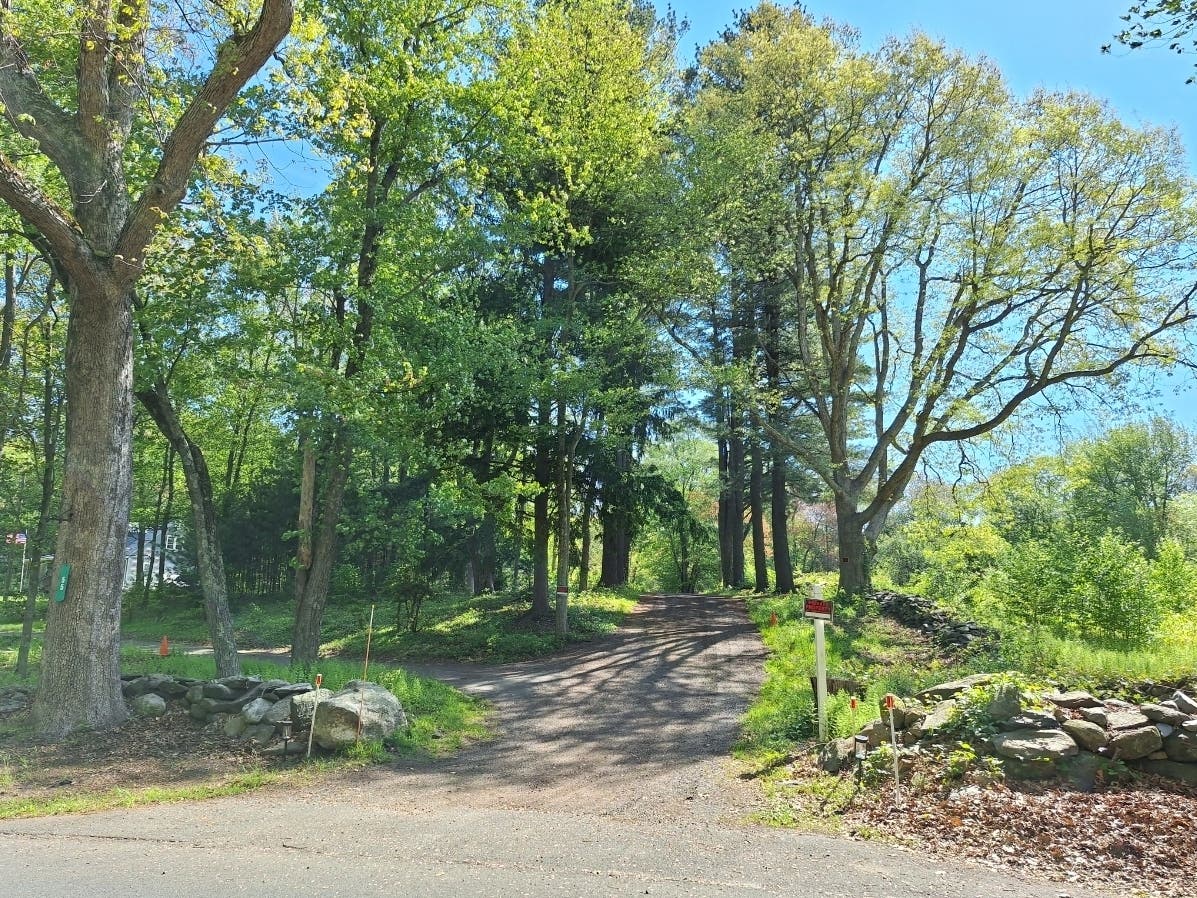 55 Mountain Spring Road, Tolland, where authorities raided a suspected gambling and cockfighting operation.