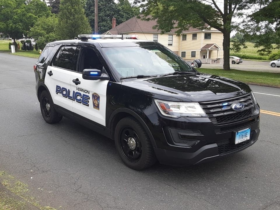 A delivery driver is accused of implying his self-defense weapon was a real gun in Vernon, police said. 