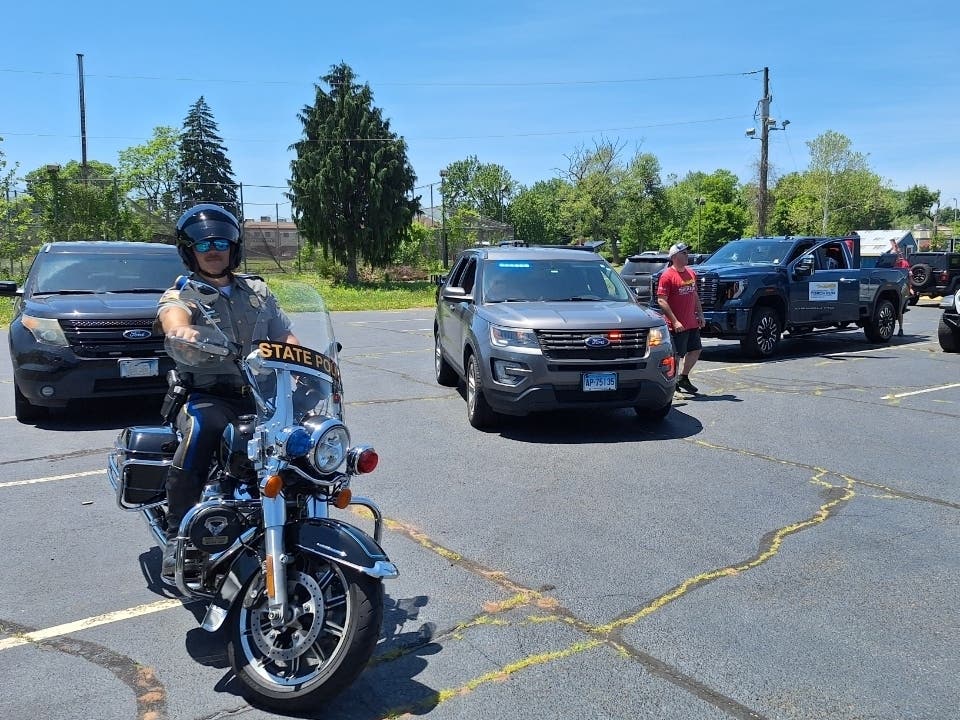 The Special Olympics Law Enforcement Torch Run made its way through Tolland County Thursday.