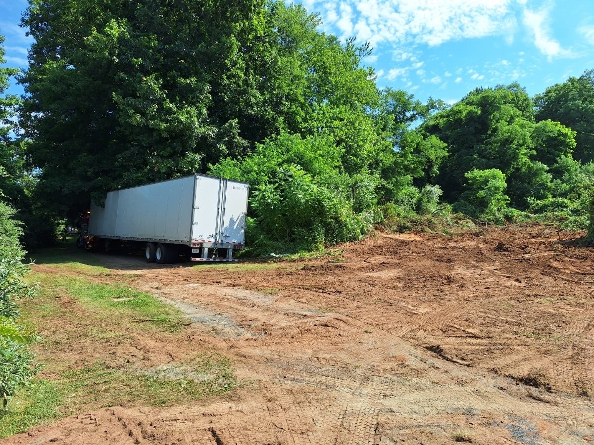 A tractor-trailer had to be meticulously removed from the rail trail system in Vernon Wednesday after crashing off the nearby highway.