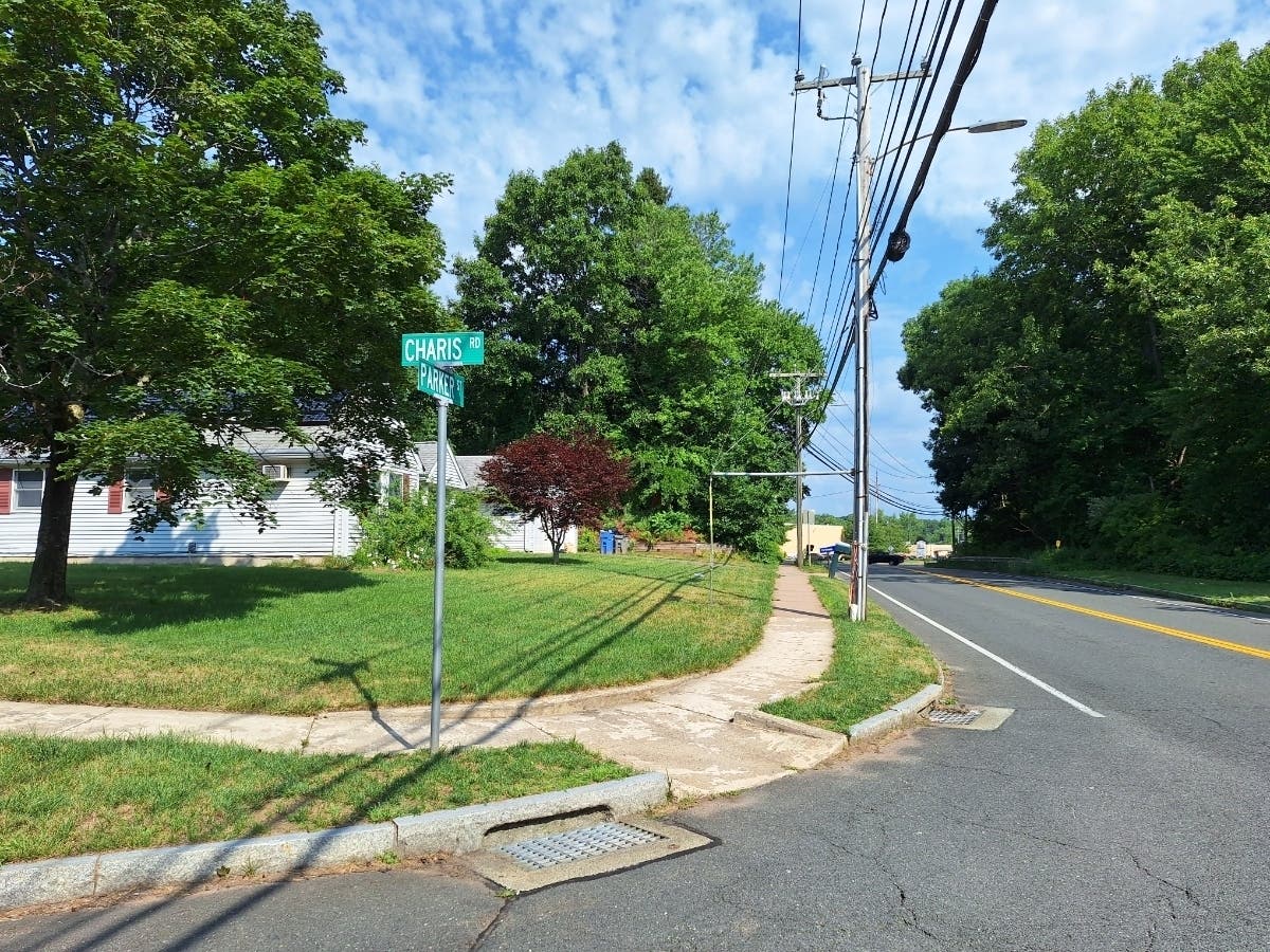 A teen armed with a knife was shot by police Sunday night during a domestic incident in a Manchester neighborhood, police said.