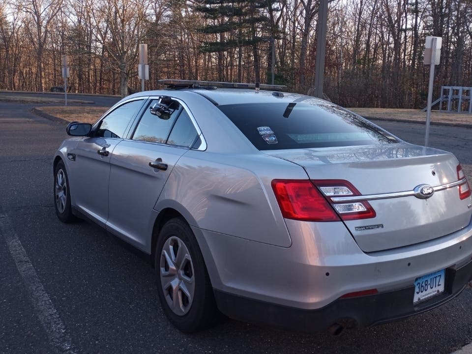 State police said a box truck and mini bus were a bad combo on a gravel road in Tolland.