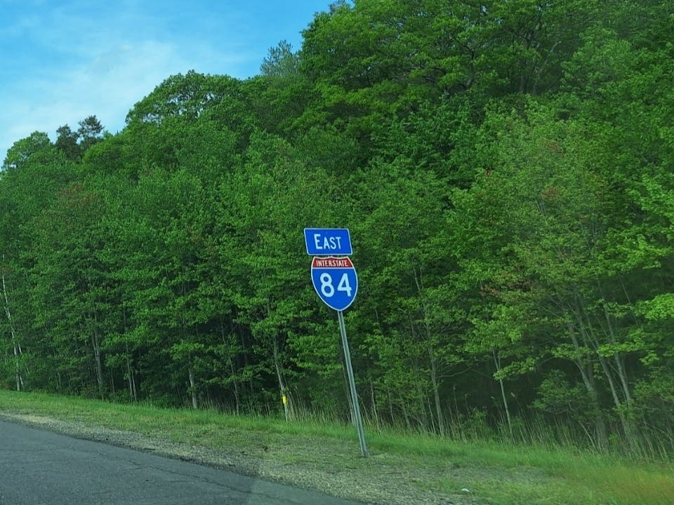 A trailing car was damaged after hitting blown-out tire debris on a stretch of highway in Willington, state police said. 