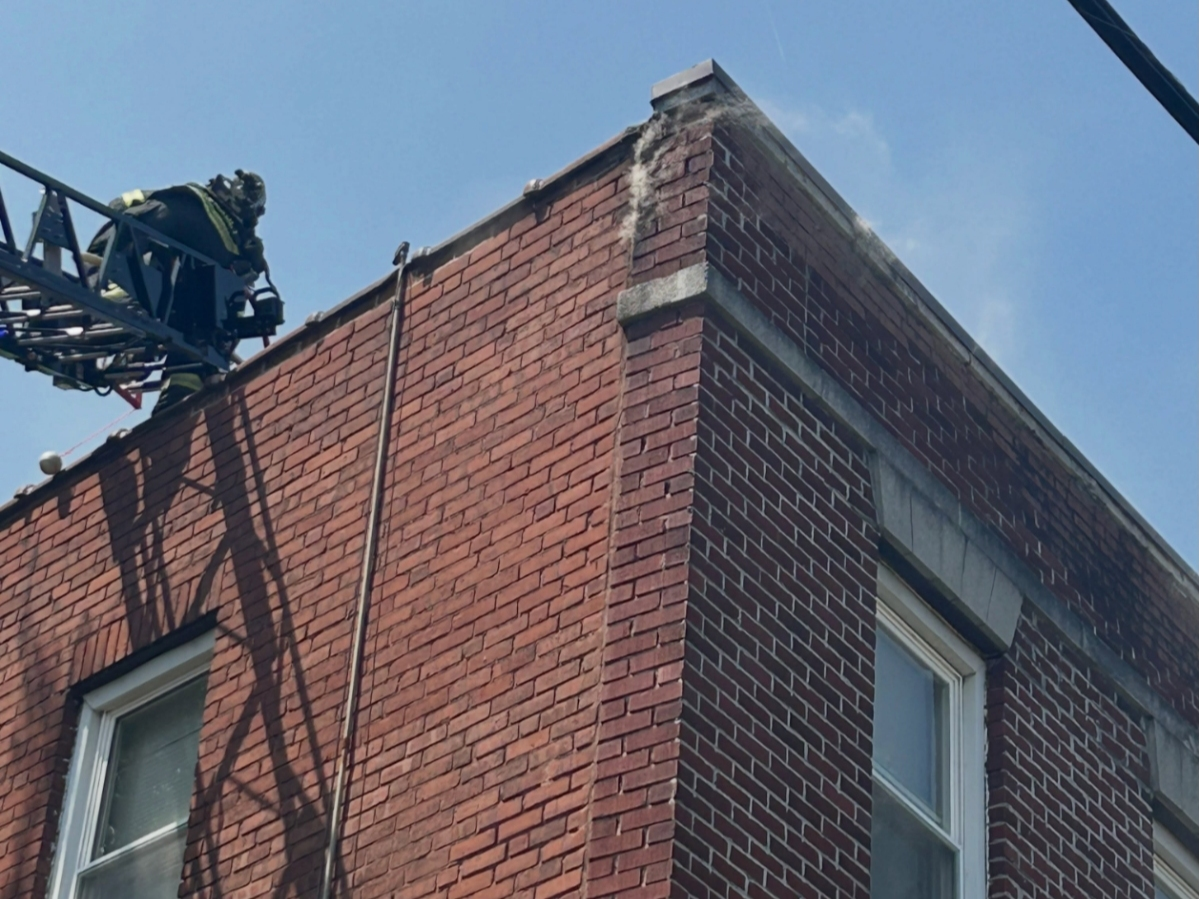 Firefighters made quick work of a building fire in Middletown from a rooftop Saturday. 