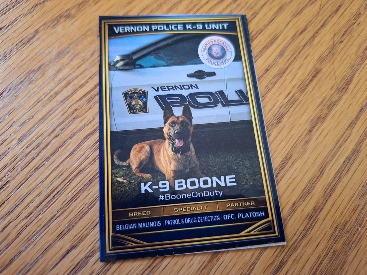 Vernon police dog Boone's trading card.