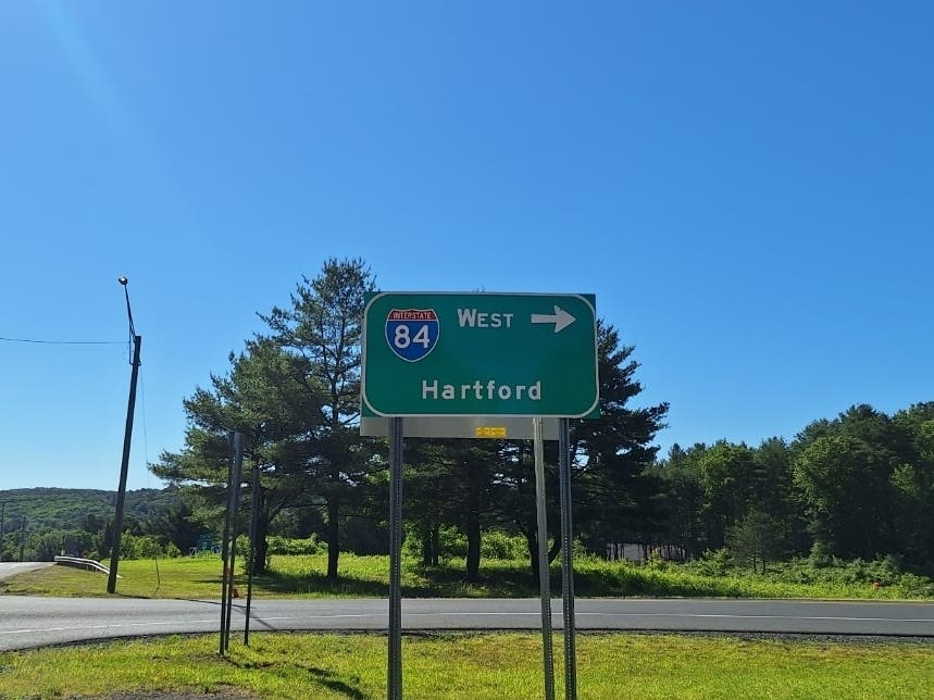 A New York City man's sport utility vehicle slammed into a rock on a rainy trek on Interstate 84 over the weekend, state police said.