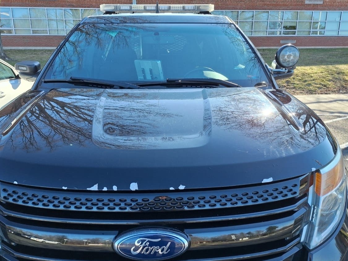 A driver fled along a stretch of sidewalk despite damaged tires, hit several cars and a passenger bailed out — all during a wild scene in Middletown, police said.