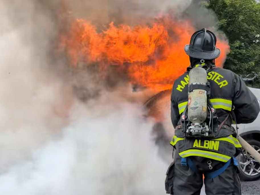 A raging car fire was extinguished by firefighters Friday.