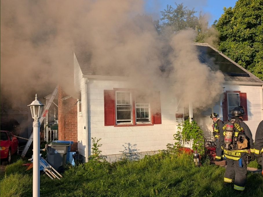 Three residents were displaced after a fire broke out at a Manchester home Friday morning.