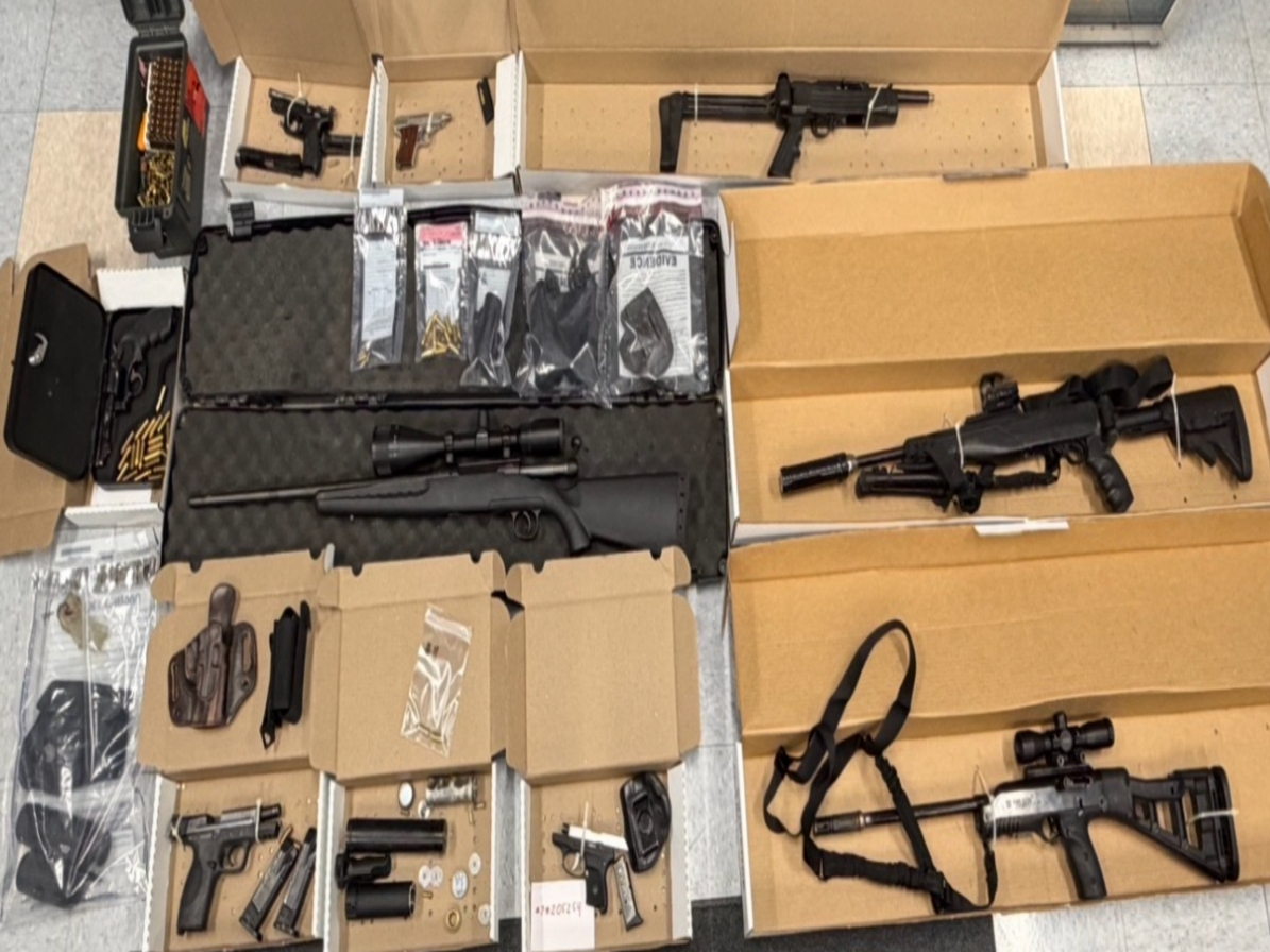 Guns were located in a home as Manchester police served a warrant to the resident Thursday. 