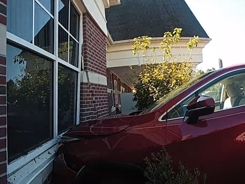 A car crashed into a building in Glastonbury Tuesday. 