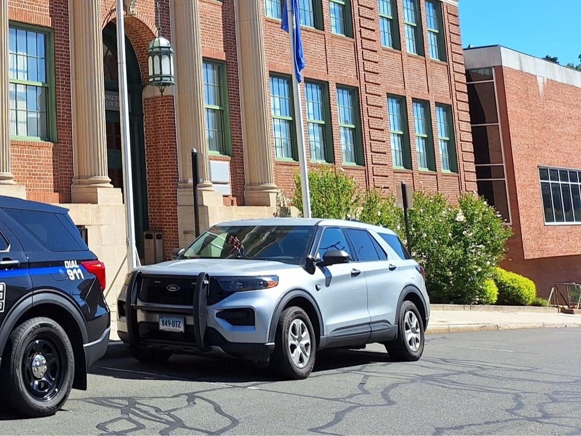 The defendants in a Tolland cockfighting case appeared in Rockville Superior Court Friday.
