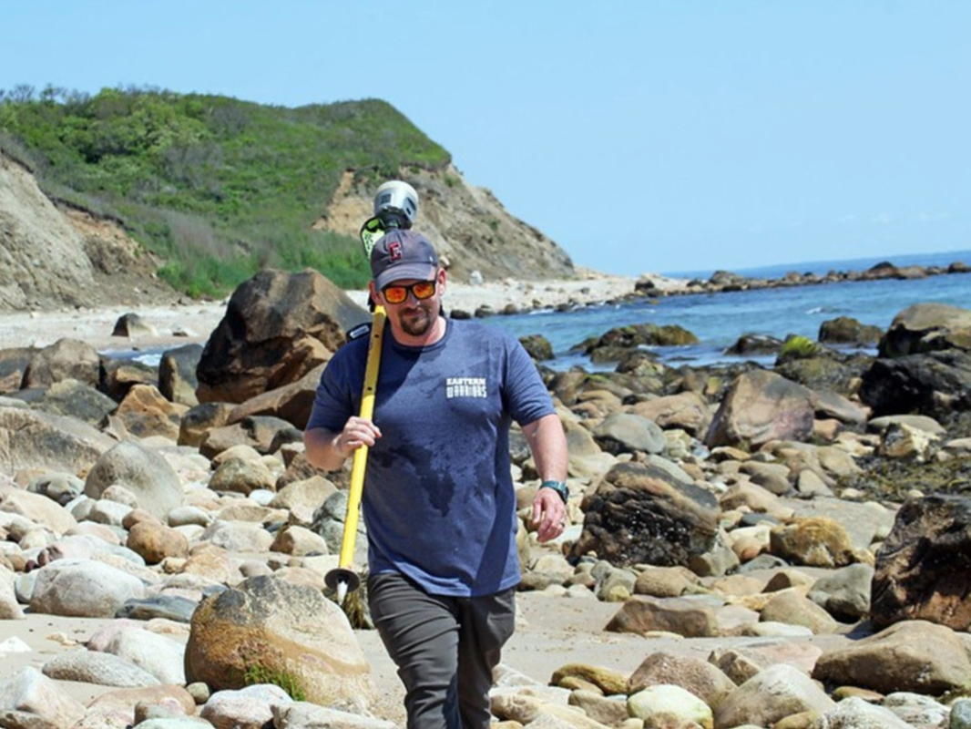 Bryan Oakley walks along the Block Island coast.