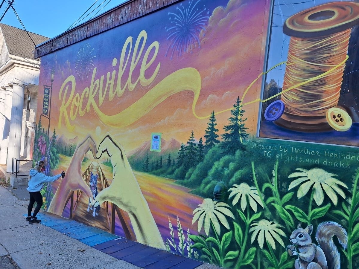 Artist Heather Herindeen and the new Rockville mural.