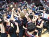 New Canaan players celebrate their Division IV championship over Granby Saturday.