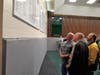 Enfield Hall of Fame honorees Marty Green, Joe Andrychowski and Tim Desjardin check out the champions walls.