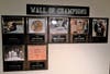 In the entryway to the wrestling room is the "Wall of Champions," featuring all seven State Open champions.