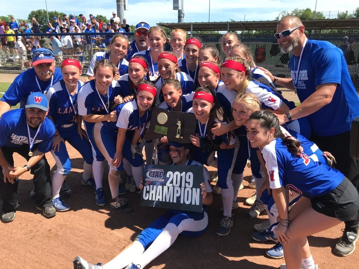 Waterford celebrates its Class M championship win over Seymour Saturday.